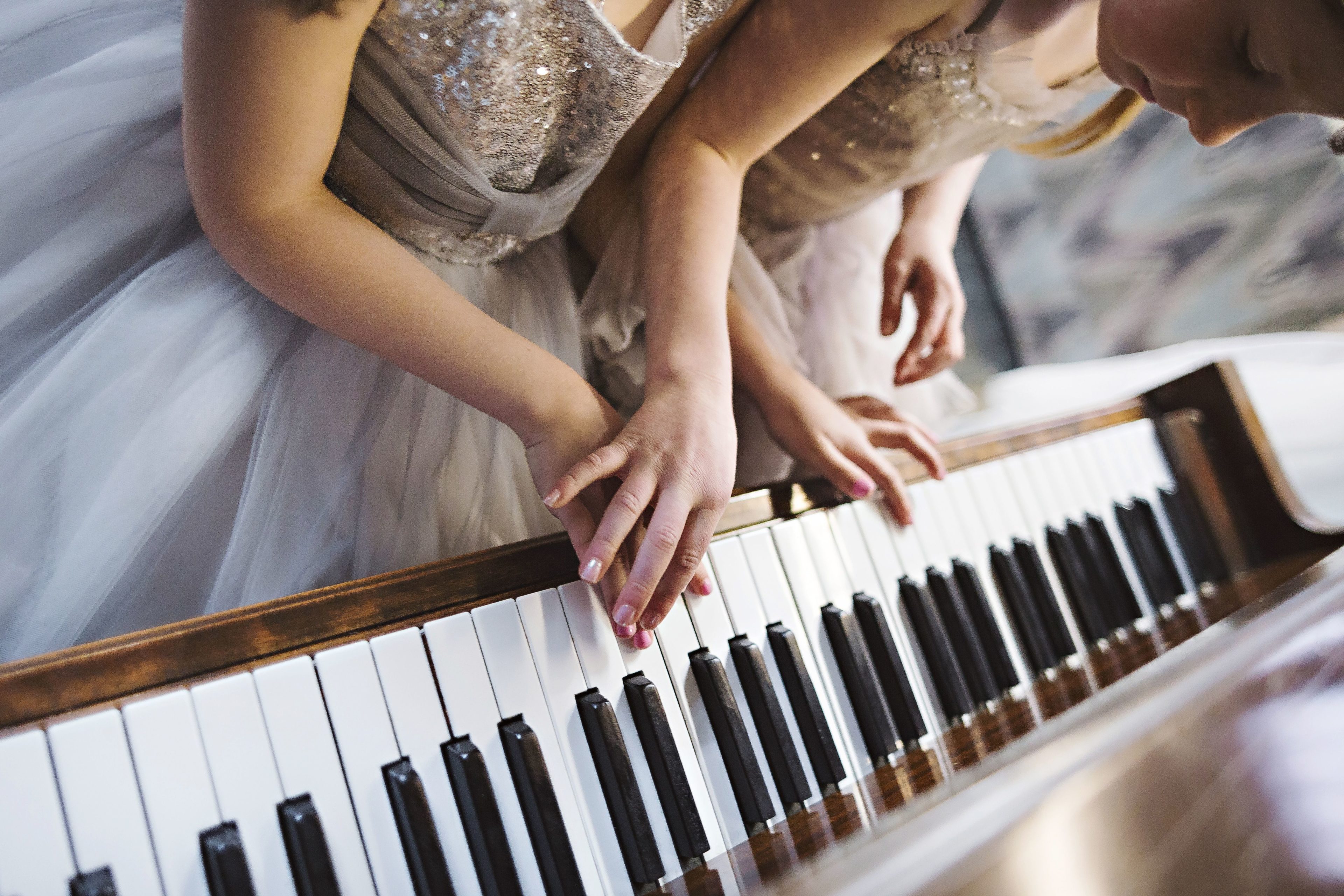 Flower girls playing piano