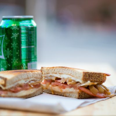 Grilled sandwich and a soda