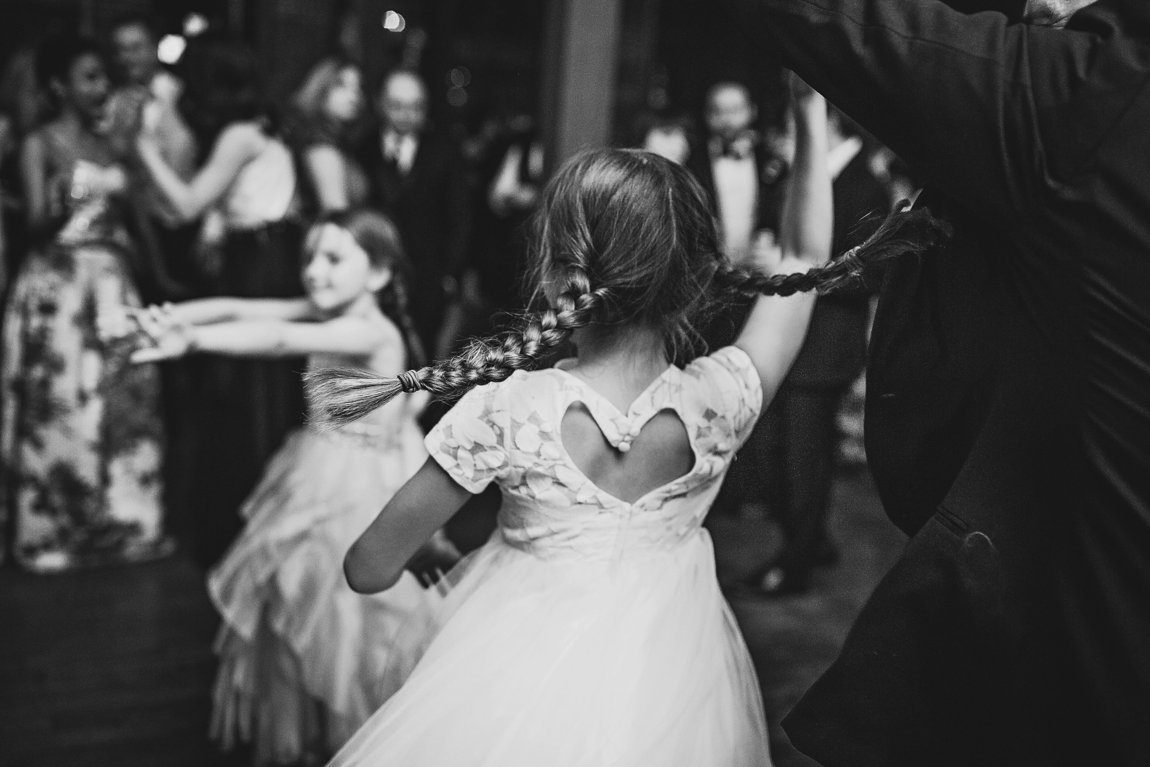 Little girls dancing in braided pigtails