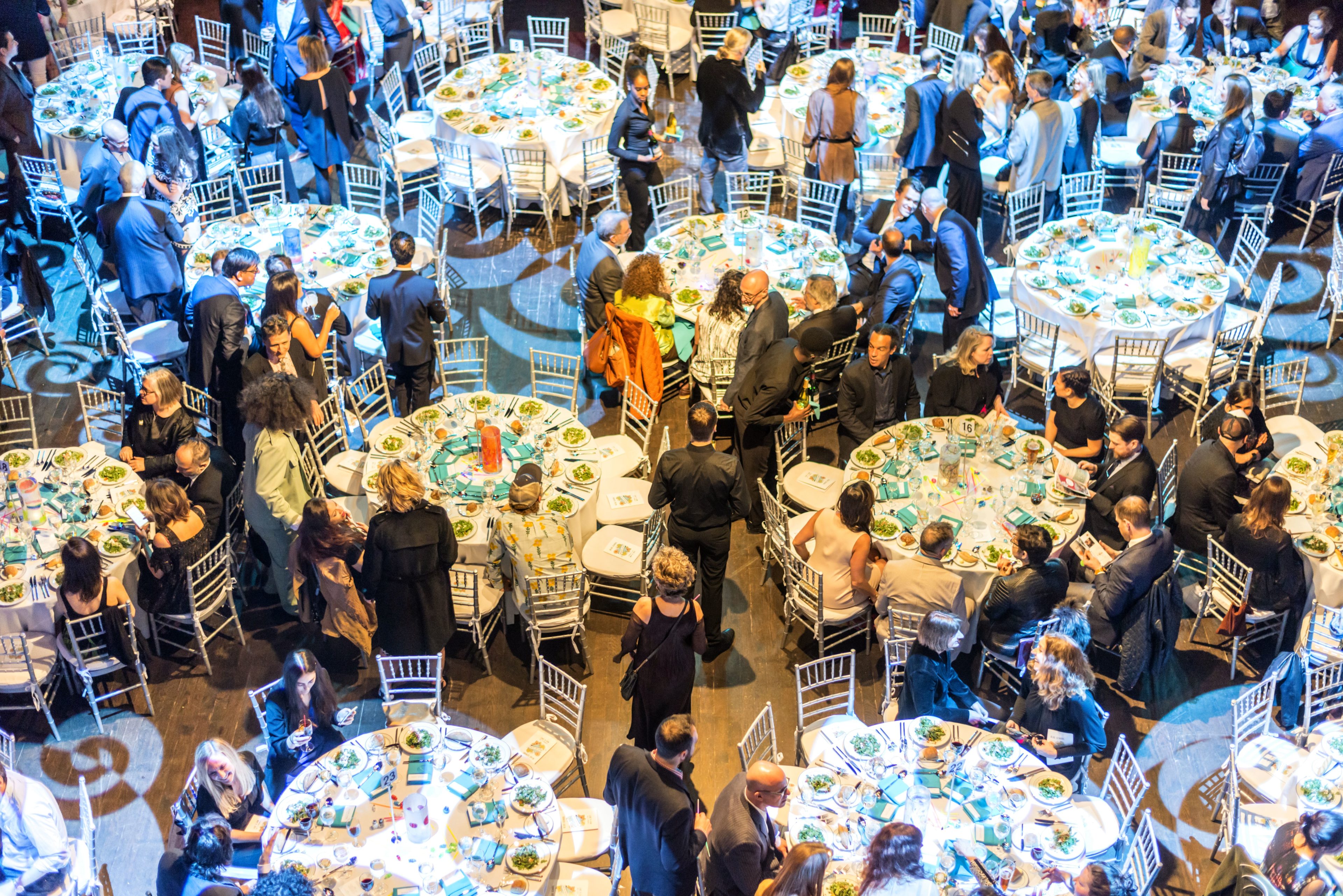 Caproate dinner event utilizing round tables
