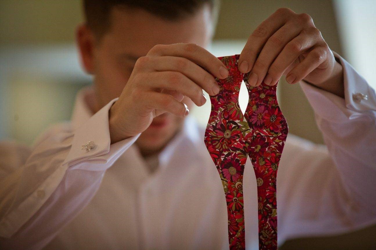 Untied red floral bowtie